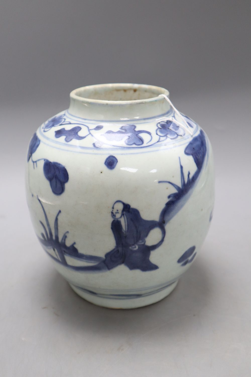 A Chinese Late Ming blue and white landscape jar, height 19cm, with certificate of authenticity, restored rim